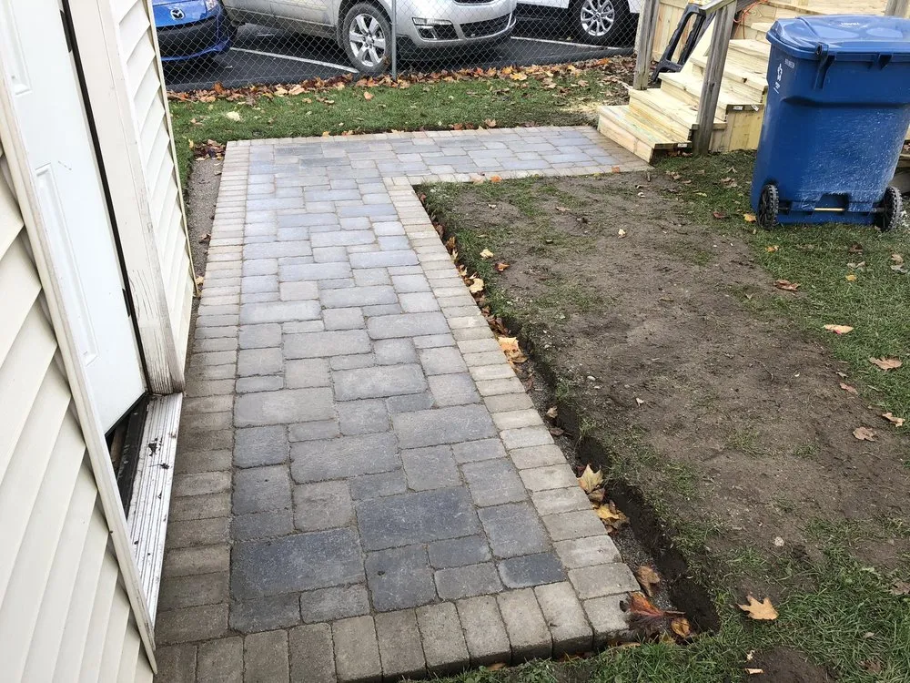 Professional yard maintenance for residential properties in Byron, MI by Royalty Services