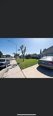 Roy’s Landscaping Maintenance Logo