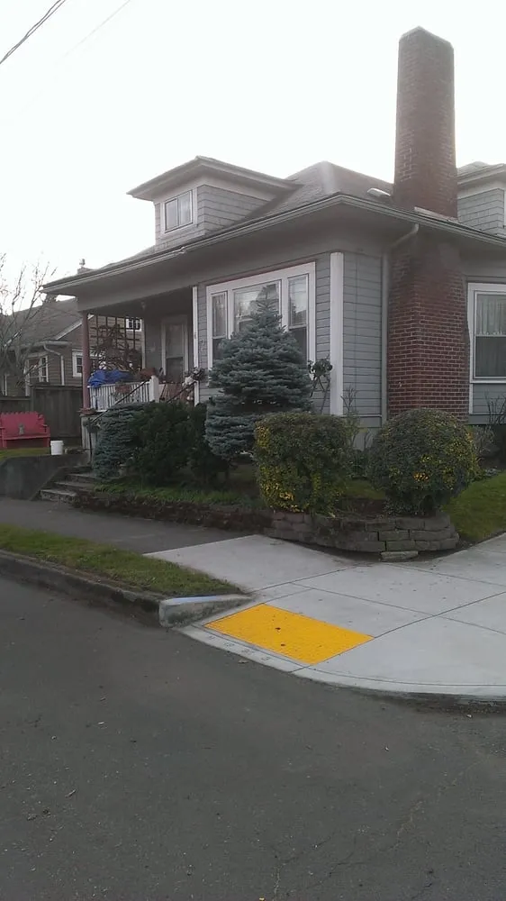 Affordable lawn care service with custom design in Milwaukie, OR by Roy's Yard and Haul LLC