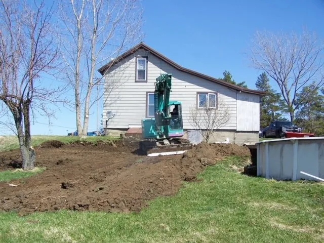 Custom lawn care service for residential properties across Springville, NY - RP Universal