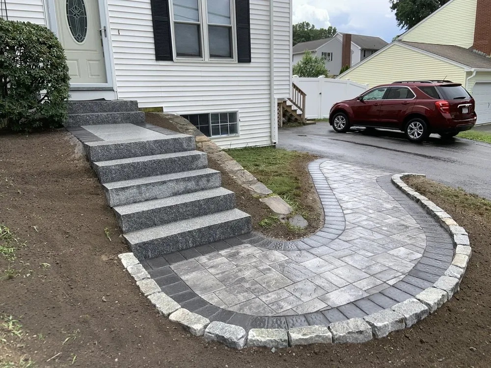 Custom landscape installation for beautiful yards in Framingham, MA by RS Construction and Landscaping