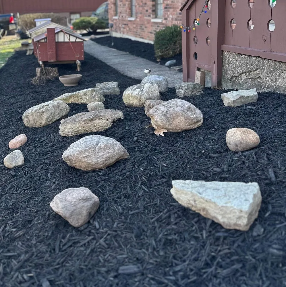 Professional outdoor landscaping with custom design in Fairborn, OH by RT Lawn Care L.L.C.