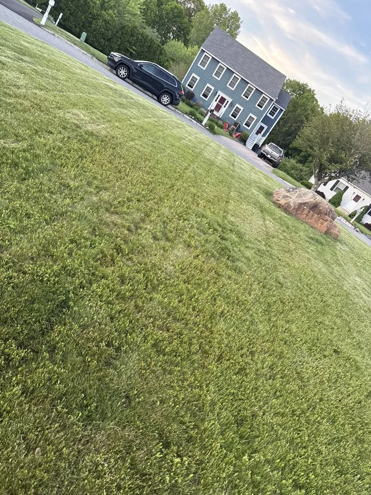 Local landscape design with custom design in Bridgewater, MA by RT Mowing