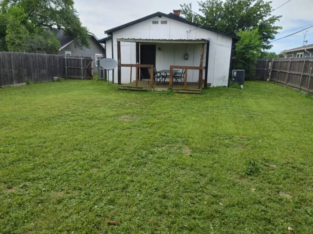 Affordable lawn mowing service for homes in Amarillo, TX by RTA & CO.