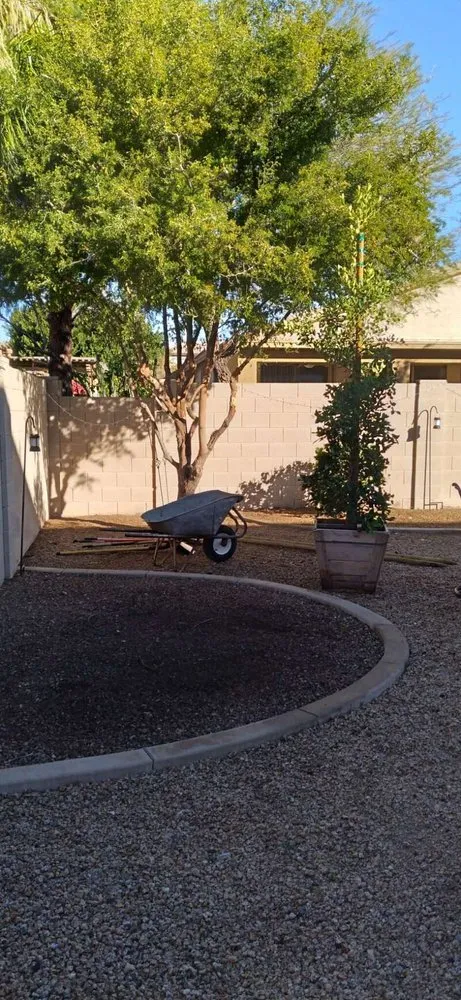 Custom outdoor landscaping in Buckeye, AZ by Rubenator Tree And Landscape Service