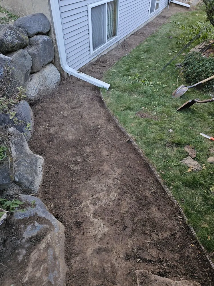 Trusted yard maintenance for beautiful yards in Madison, WI by Ruben's Lawn Care Services & Dumpster Rentals