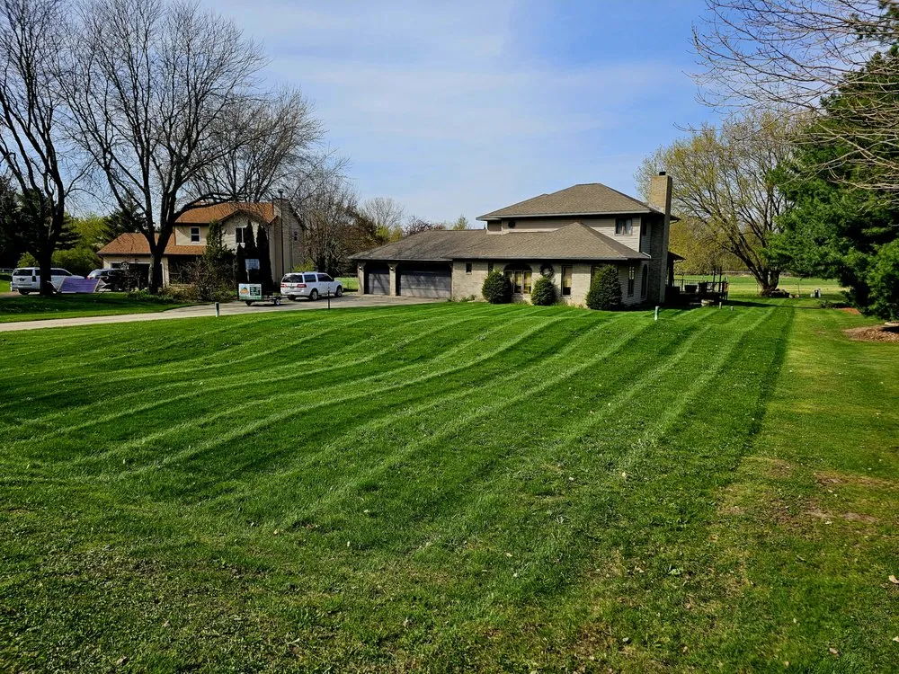 Top-rated landscape installation for year-round maintenance in Madison, WI by Ruben's Lawn Care Services & Dumpster Rentals