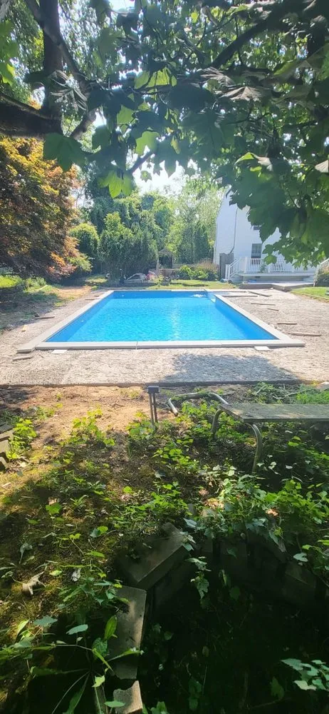 Professional landscape design with custom design in Calverton, NY by Rubio Cleaning & Landscaping