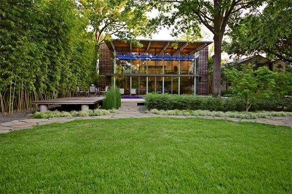 Custom yard cleanup service for homes in Flanders, NY by Rubio Landscaping