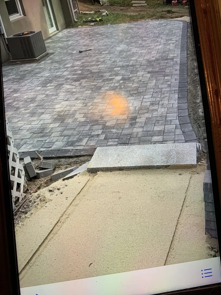 Professional yard maintenance for residential properties in Providence, RI by Rudis Landscaping