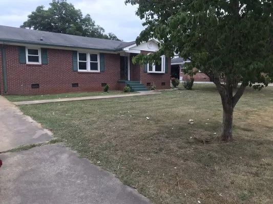 Ruggles Lawn Care Logo