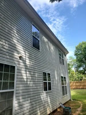 Running Blades Lawn Care Logo