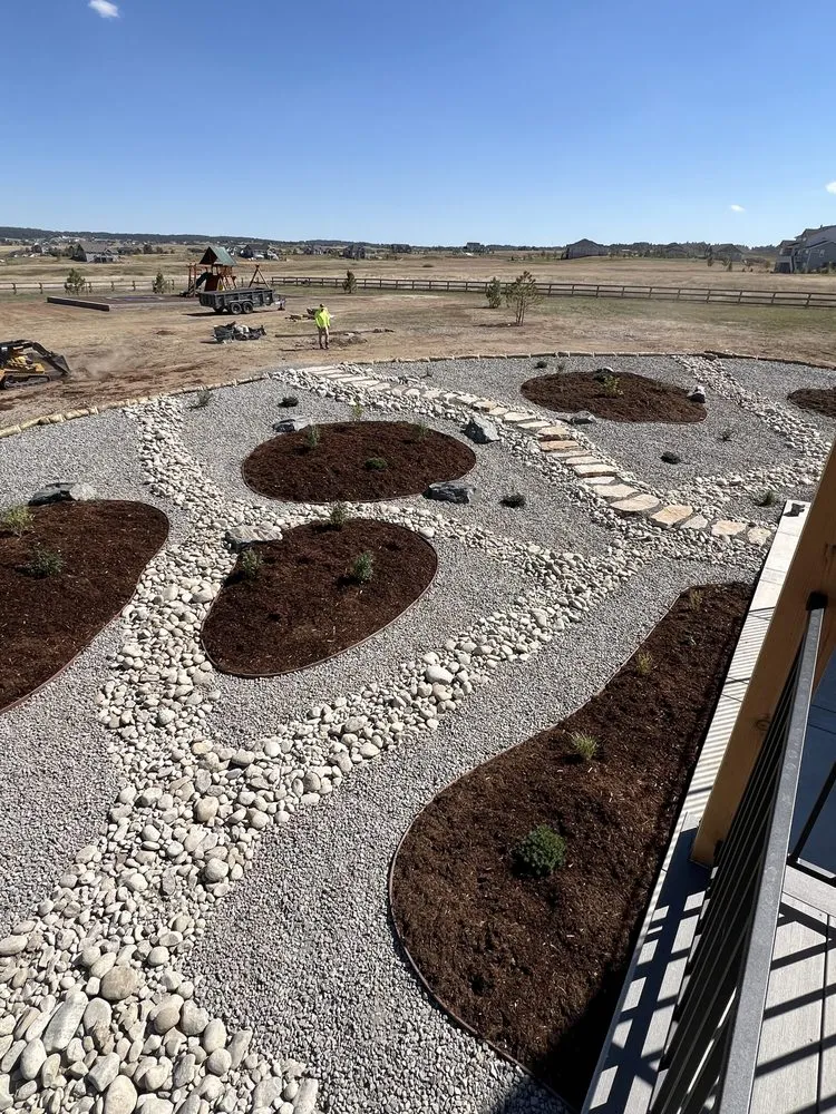 Custom landscape installation in Elizabeth, CO by Running Creek Contracting