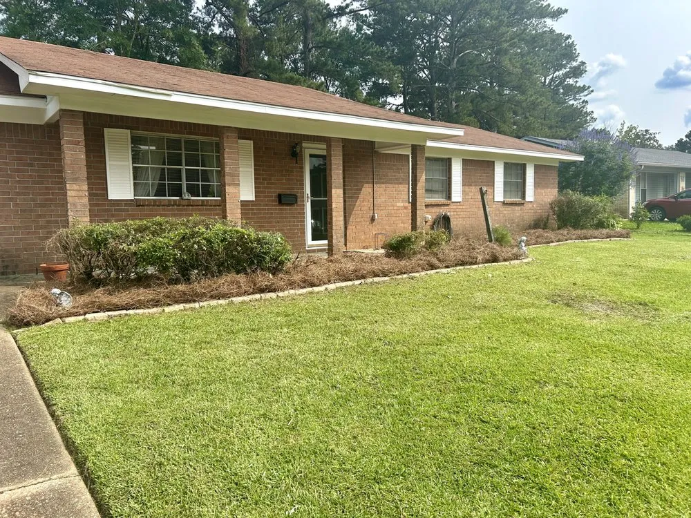 Affordable lawn care service for year-round maintenance across Jackson, MS - Running Man