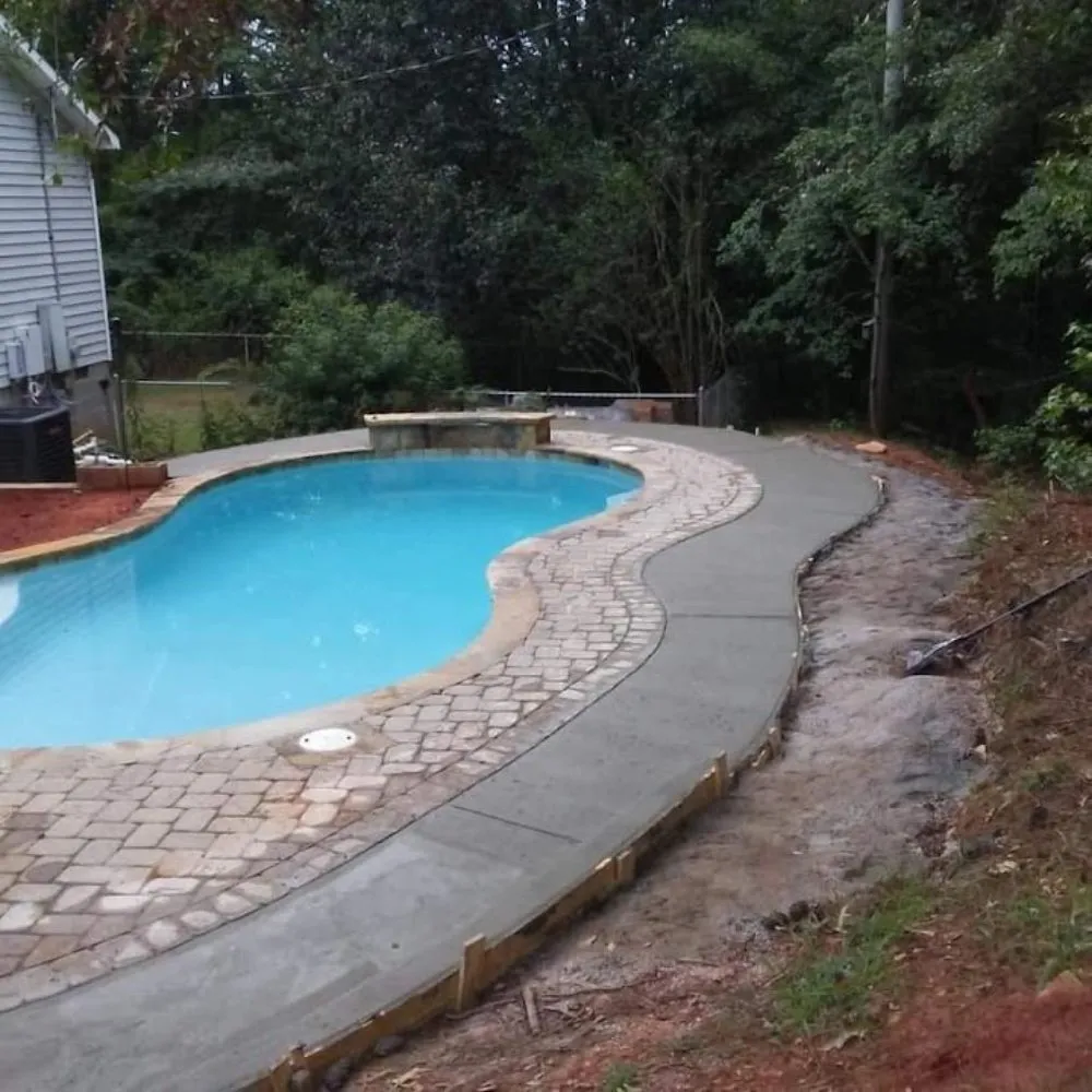 Local yard maintenance with custom design in Clanton, AL by Rural Concrete Contractor