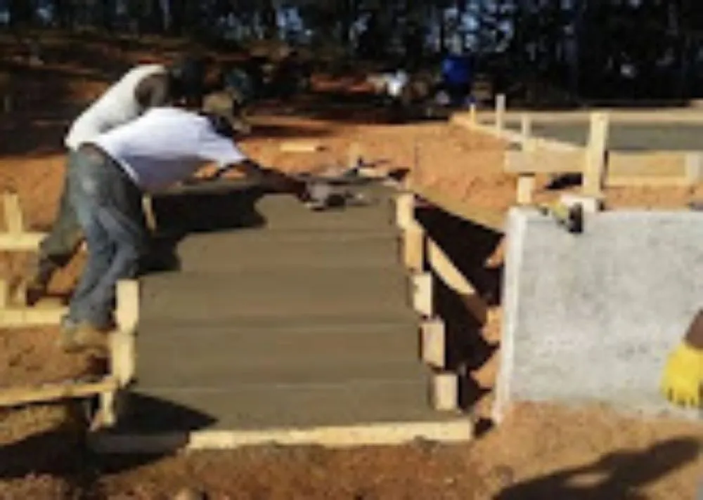 Custom garden landscaping with custom design in Clanton, AL by Rural Concrete Contractor