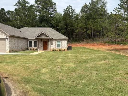 Russell Lawn and Landscaping Logo