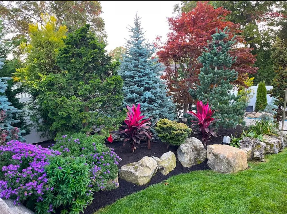Custom landscape installation in Babylon, NY by Rustic Roots Landscapes