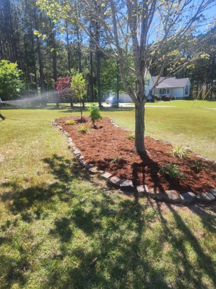 Reliable lawn care service for residential properties across Milledgeville, GA - Rustic Roots