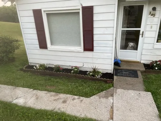 Rusty Lawn Care & Pressure Washing Services Logo