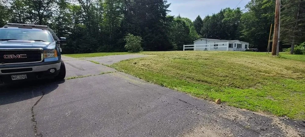 Reliable landscaping services for year-round maintenance in Lebanon, ME by Ryan Heriot Lawn Care Snow Plowing