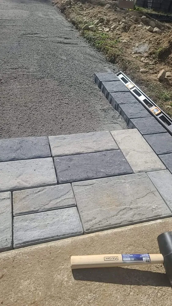 Professional outdoor landscaping for residential properties across Lebanon, ME - Ryan Heriot Lawn Care Snow Plowing