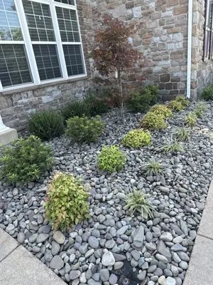 Ryan's Landscaping and Waste Management Logo