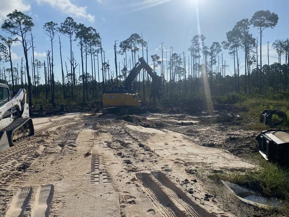 Professional landscape installation for outdoor upgrades in Port St. Joe, FL by S & J Roll Off and Tractor Services