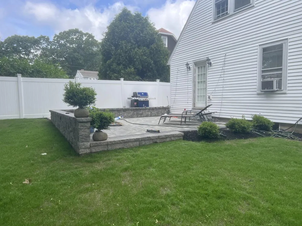 Reliable landscape installation for year-round maintenance in Holbrook, MA by S & M Tree Services