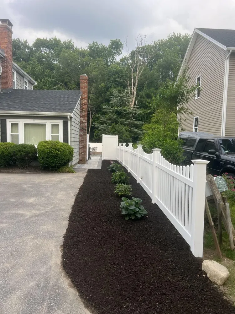 Custom landscape installation in Holbrook, MA by S & M Tree Services