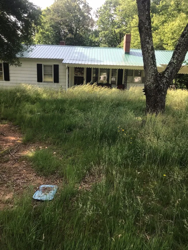 Affordable yard maintenance with custom design in New London, NC by S & S Lawn Care