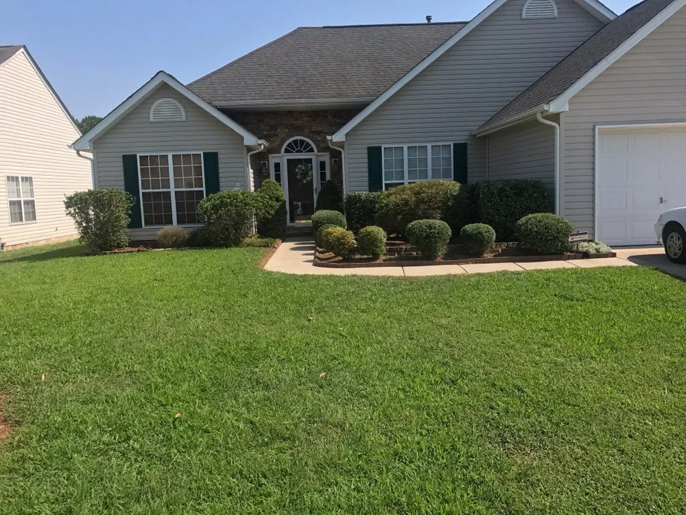 Local landscaping services for residential properties in New London, NC by S & S Lawn Care