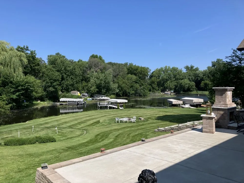 Custom landscape installation for year-round maintenance in Lakeville, MN by S & Sam’s Lawn & Landscape