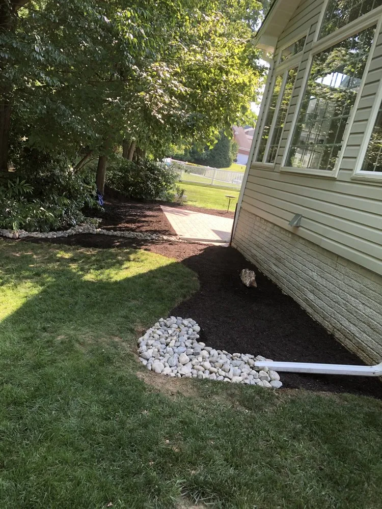Professional landscape installation with custom design across Abingdon, MD - S K Services
