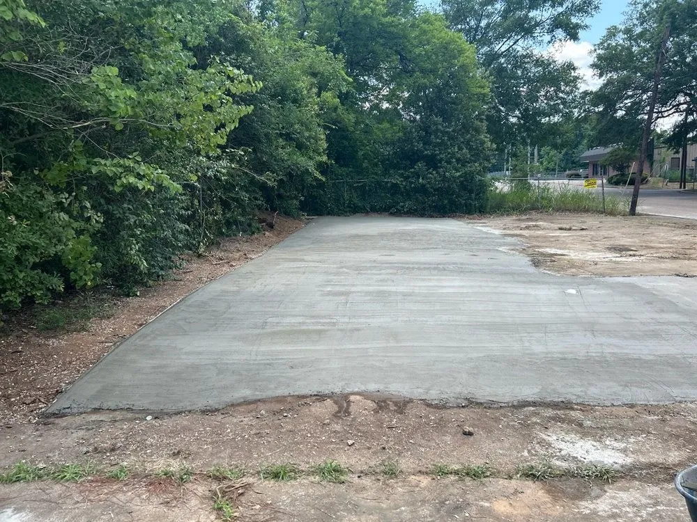 Custom residential landscaping with custom design in Monroe, LA by S n S Concrete and Flowerbed