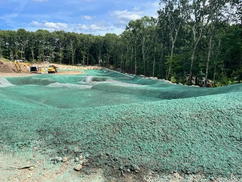 Affordable lawn mowing service for homes in Coventry, RI by Saccoccia's Construction