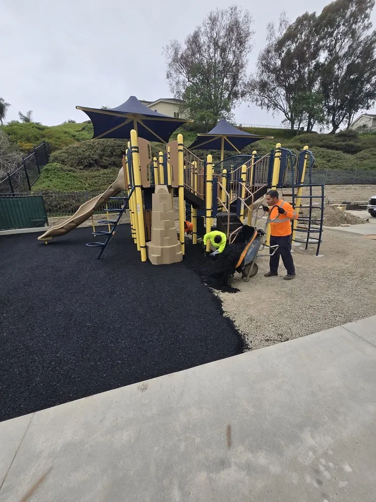 Custom landscape design for year-round maintenance in Compton, CA by SafePlay, Inc.