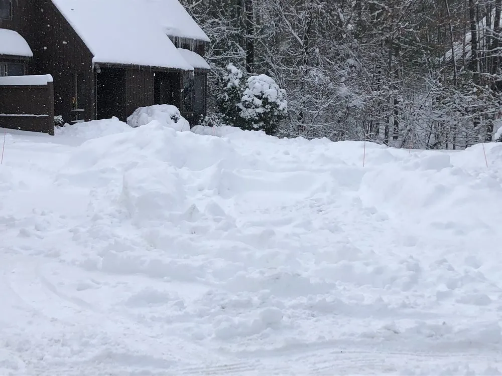 Custom outdoor landscaping with custom design in Nashua, NH by Saints Landscaping