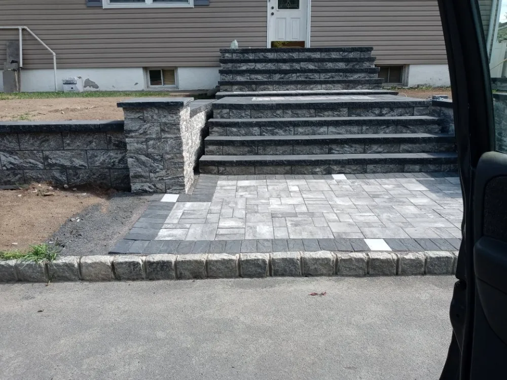 Custom landscape installation for outdoor upgrades in Passaic, NJ by Salazar landscaping