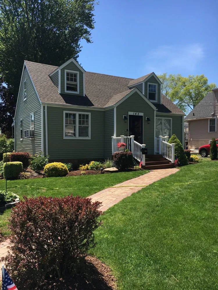 Professional yard cleanup service for homes in Stratford, CT by Salazar lawn care