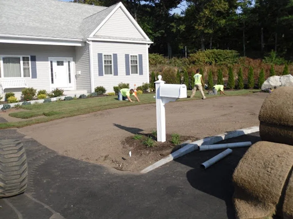 Custom lawn care service for year-round maintenance in Walpole, MA by SalCorp Landscaping & Construction