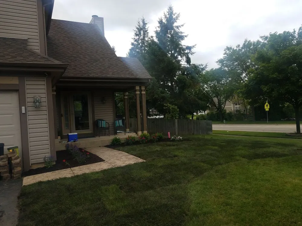 Custom landscape installation in West Chicago, IL by Salinas Landscaping