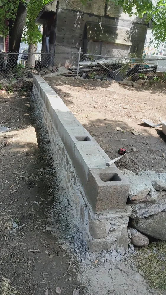 Professional landscape installation with custom design in Worcester, MA by Sammy's Handy Master Service