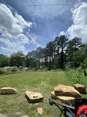 Sam’s Handyman Lawn And Landscaping Service Logo