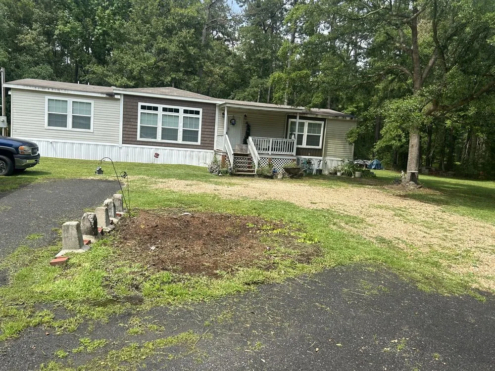 Local landscape design for year-round maintenance in Loranger, LA by Sam’s lawn care
