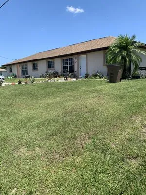 Sam’s Lawn Service Logo