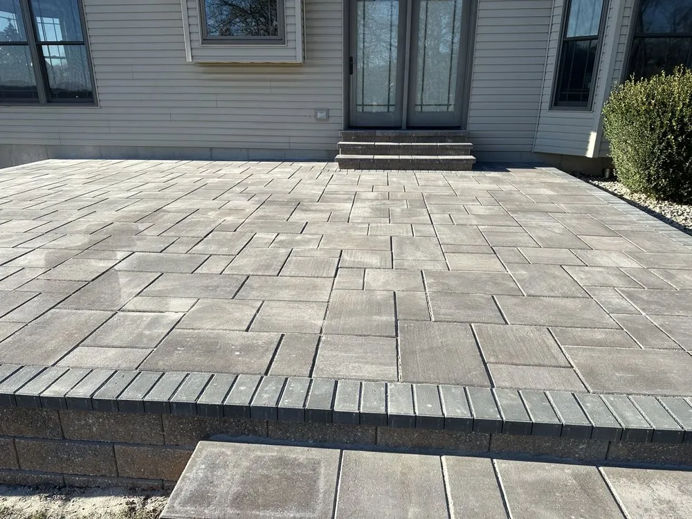 Custom residential landscaping with custom design in Pacific, MO by Sam's Retaining Walls