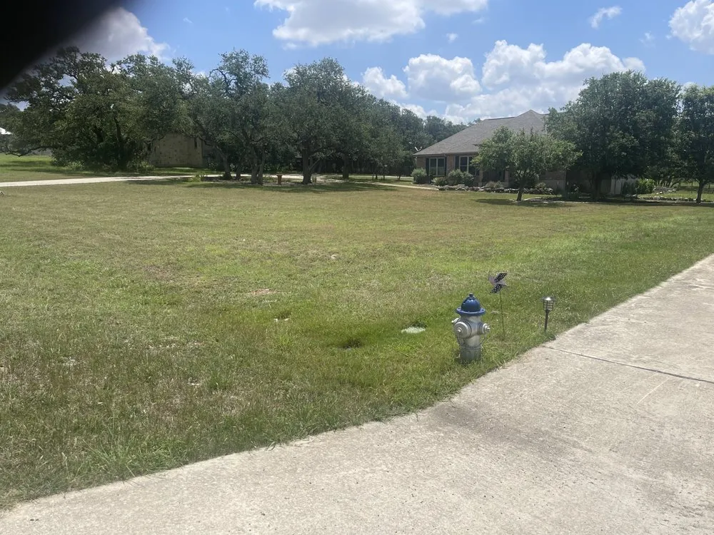 Expert landscape design in New Braunfels, TX by Sanchez Roots Lawn Service