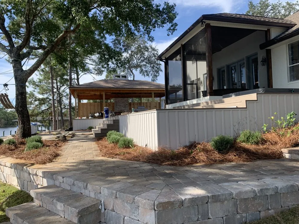 Affordable yard cleanup service for homes across Navarre, FL - Sandbox Boyz