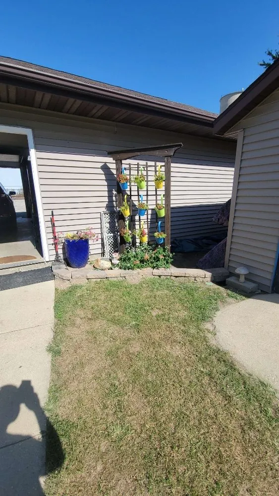 Custom landscape installation in Macomb, IL by Sandlin Roofing & Landscaping